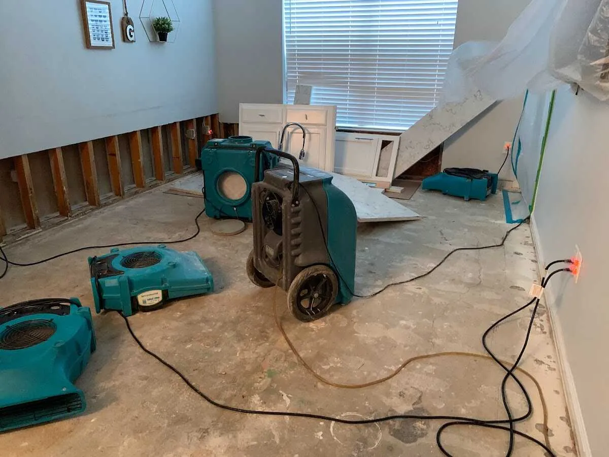 Dehumidifier in flood-cut room for Water Damage Restoration in Beckley